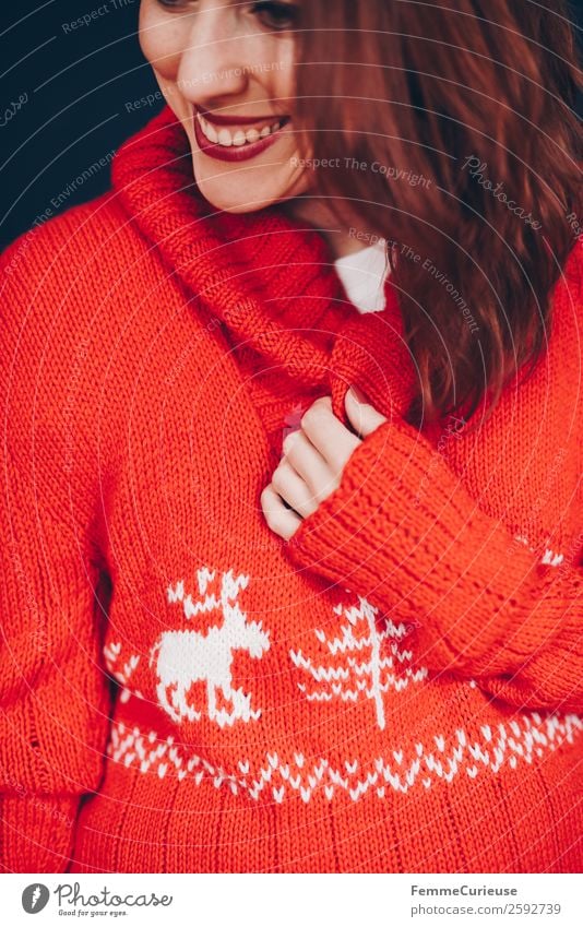 Brunette woman with red deer wool sweater Feminine Woman Adults 1 Human being 18 - 30 years Youth (Young adults) 30 - 45 years Red Well-being