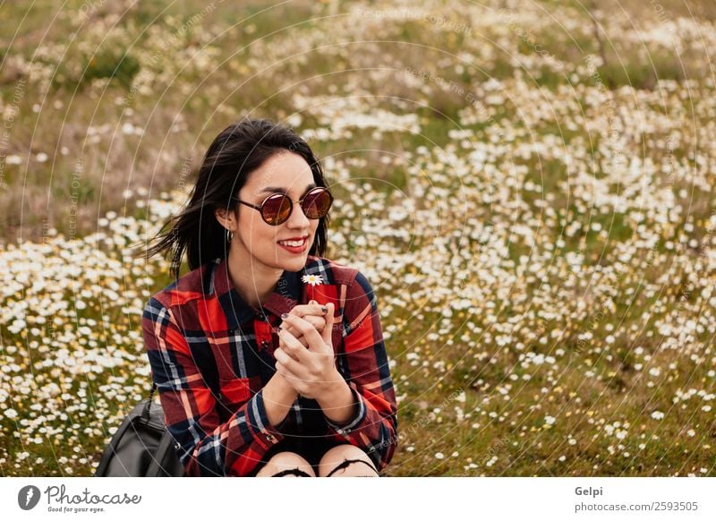 Pretty brunette girl Lifestyle Joy Happy Beautiful Face Wellness Relaxation Human being Woman Adults Nature Sky Flower Grass Blossom Park Meadow Sunglasses