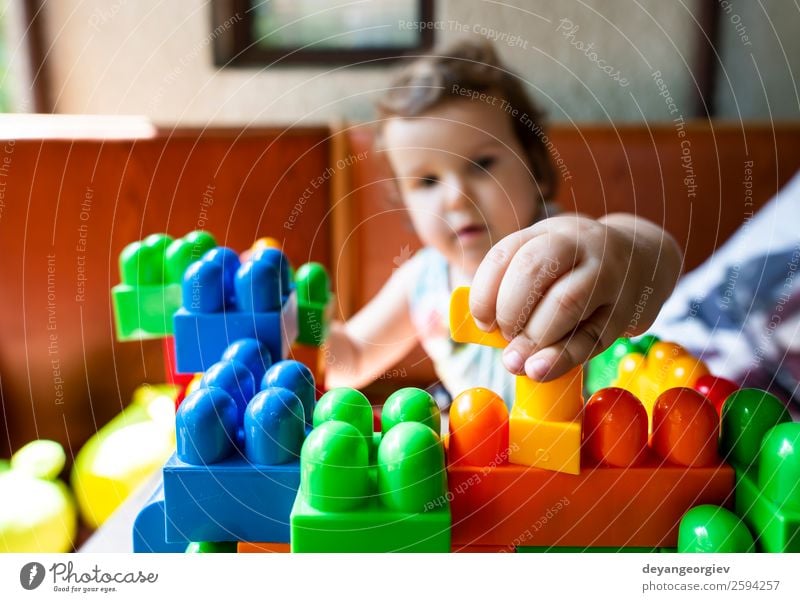 Child playing with cubes Joy Leisure and hobbies Playing Kindergarten School Baby Toddler Infancy Building Toys Small kid nursery blocks kids girl education