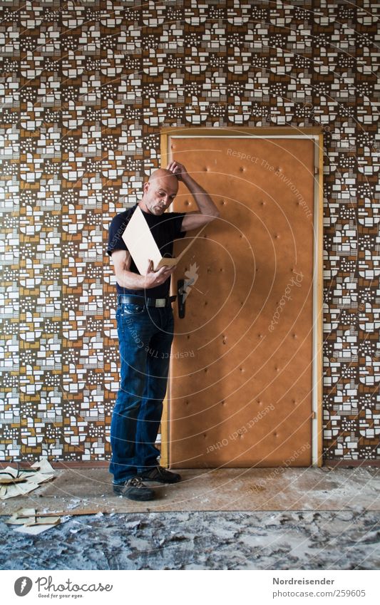 Man with his personnel file in front of a door Lifestyle Style Design Interior design Wallpaper Examinations and Tests Work and employment Office work Career