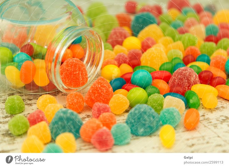 Colorful jelly beans of different sizes close to wallpaper Fruit Dessert Candy Wallpaper Feasts & Celebrations Birthday Infancy Group Exceptional Bright