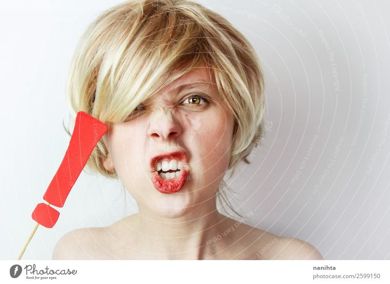 Angry young woman holding a exclamation mark Human being Feminine Woman Adults Blonde Scream Rebellious Strong Anger Red White Emotions Force Politics and state