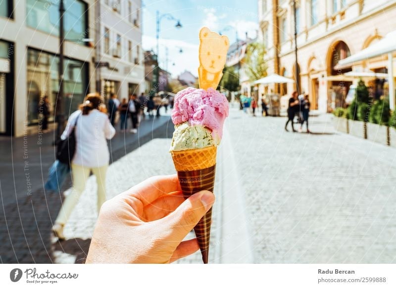 Man Holding Green And Pink Ice Cream Cone Food Dairy Products Dessert Ice cream Candy Eating Fast food Lifestyle Style Joy Vacation & Travel Tourism Adventure