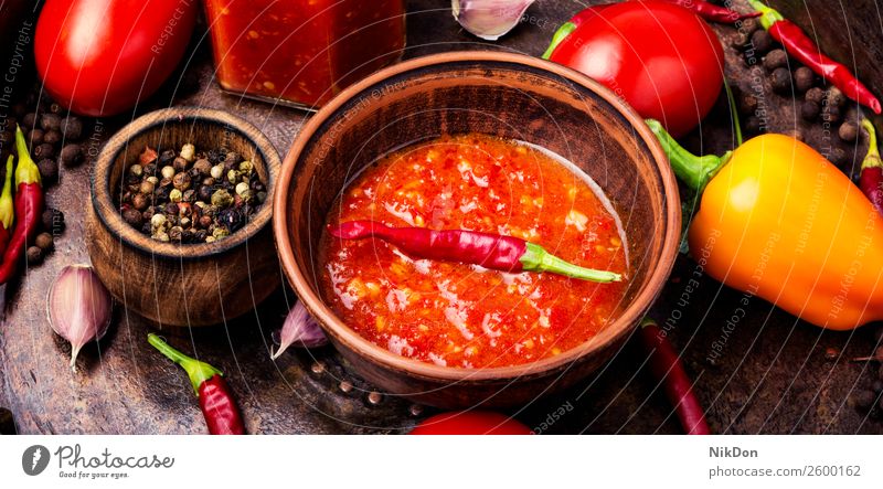 Spicy seasoning, adjika sauce spice spicy garlic food ingredient pepper hot chili tomato fresh vegetable vegetarian cuisine delicious homemade bowl coriander