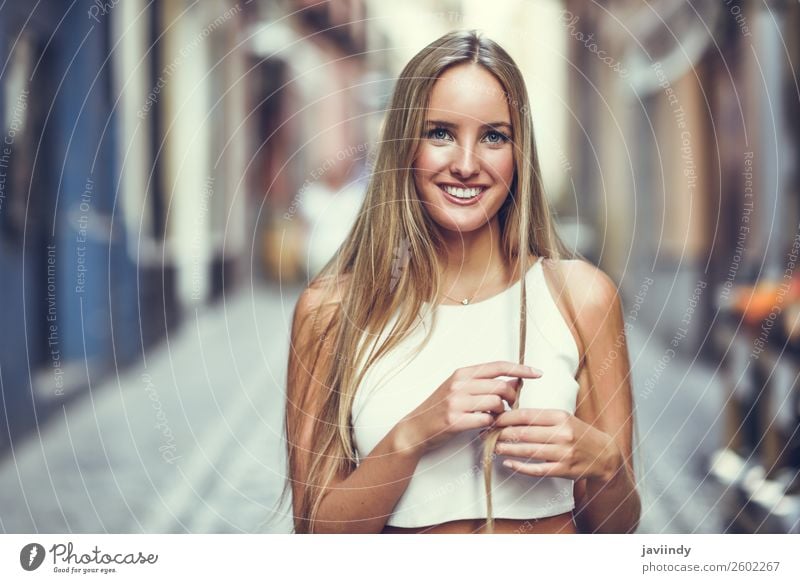 Young woman smiling in urban background. Lifestyle Elegant Style Happy Beautiful Hair and hairstyles Summer Human being Feminine Youth (Young adults) Woman