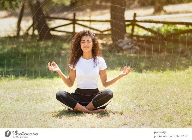 Young Arab woman doing yoga in nature. Lifestyle Happy Hair and hairstyles Relaxation Calm Meditation Summer Sports Yoga Human being Feminine Young woman