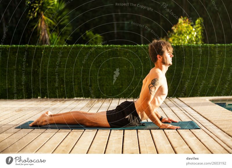 Man doing yoga outdoors at home. Lifestyle Wellness Harmonious Calm Meditation Leisure and hobbies Summer Yoga Human being Masculine Adults Body 1 30 - 45 years