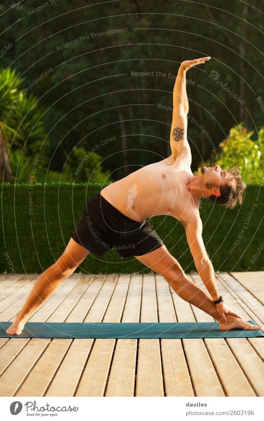 Man doing yoga in nature. Lifestyle Wellness Harmonious Relaxation Calm Meditation Leisure and hobbies Summer Yoga Human being Masculine Adults Body 1