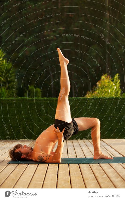 Man doing yoga in outdoors at home. Lifestyle Athletic Wellness Harmonious Relaxation Calm Leisure and hobbies Summer Yoga Human being Masculine Young woman