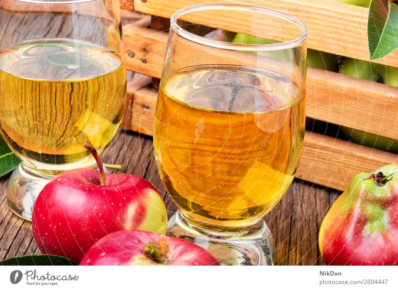 Homemade cider from ripe apples fruit drink ingredient alcohol food glass liquid juice fresh beverage autumn wooden rustic natural table nature delicious