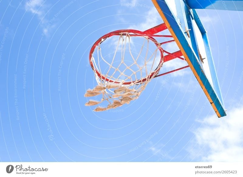A Basketball Net at a Playground Ball Baseball Sports Street Playing Hop Relaxation Sky Exterior shot Park Track and Field backboard