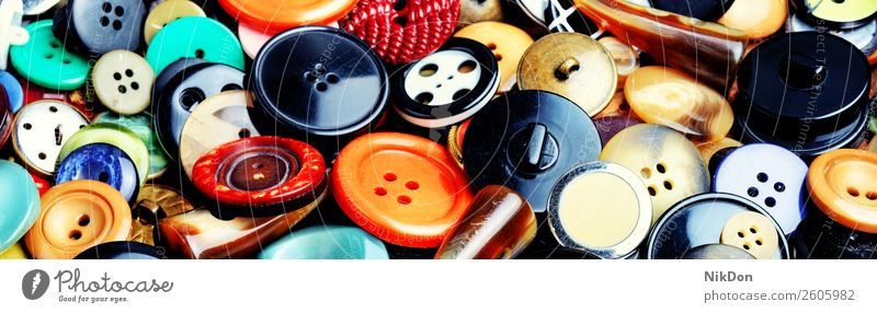 Set sewing buttons fashion clothing tailor design circle background collection plastic colorful needlework closeup group many retro various macro banner poster