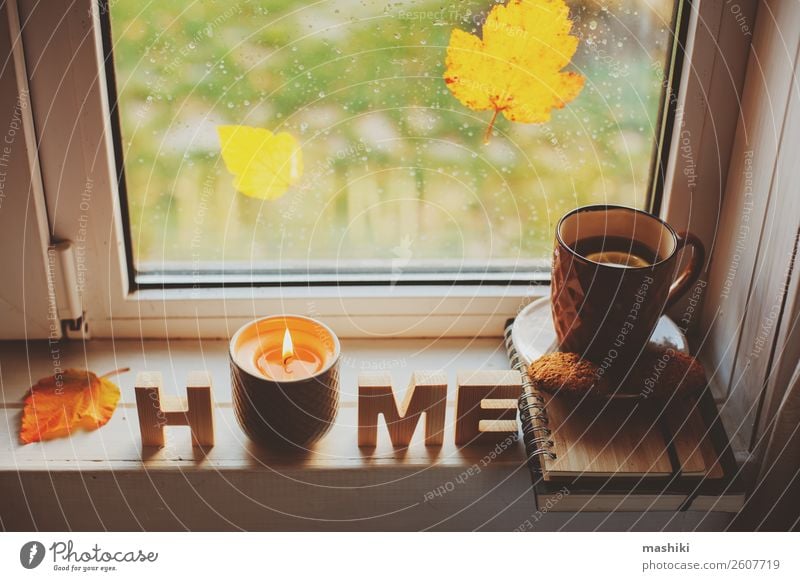 cozy autumn morning at home. Hot tea and candle Breakfast Tea Lifestyle Relaxation Reading Autumn Weather Rain Leaf Safety (feeling of) Comfortable cup window