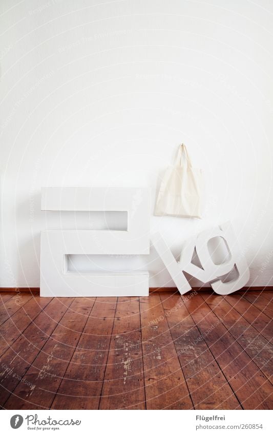 2kg load Art Stand Letters (alphabet) Cardboard Crazy Weight Kilogram jute bag Parquet floor Old building Room Floor covering Bright White Wall (building)