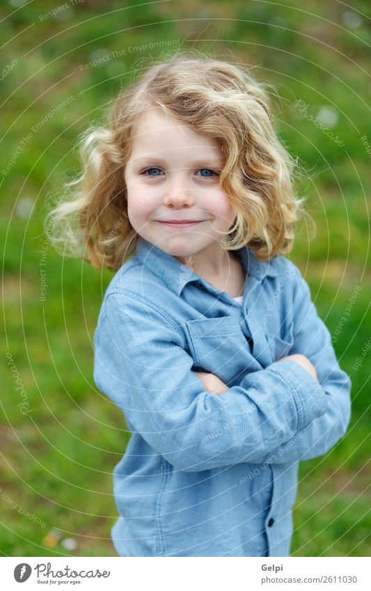 Happy small child with long blond hair Beautiful Face Summer Child Human being Baby Boy (child) Man Adults Infancy Environment Nature Plant Shirt Blonde Smiling