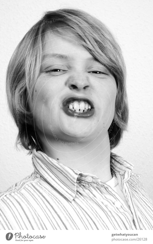 Show your teeth Child Blonde Long Shirt Stupid Portrait photograph Boy (child) Mouth Crazy Hair and hairstyles Funny Eyes Nose Black & white photo Pelt Teeth