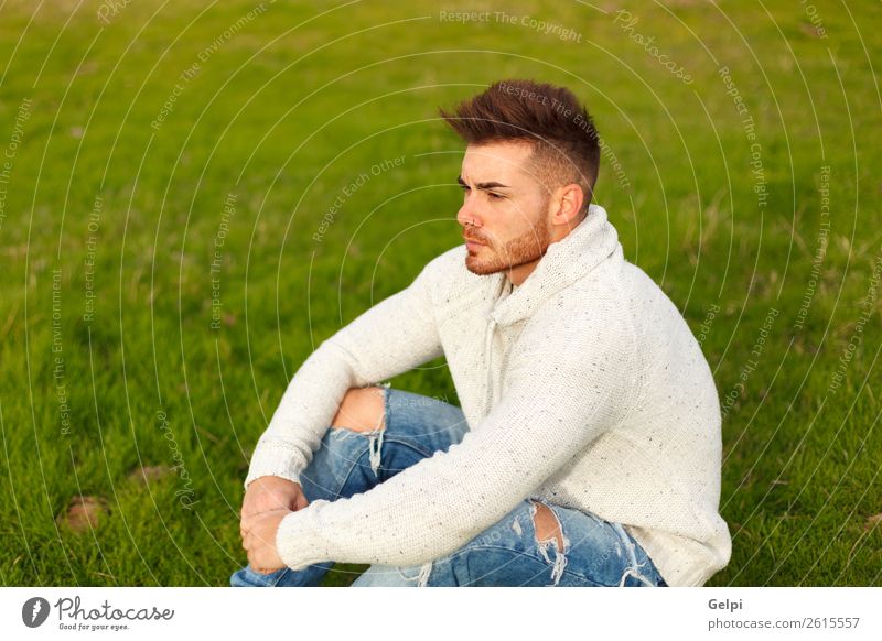 Attractive guy with beard in a green meadow Lifestyle Style Human being Boy (child) Man Adults Landscape Grass Meadow Fashion Beard Think Cool (slang) Eroticism