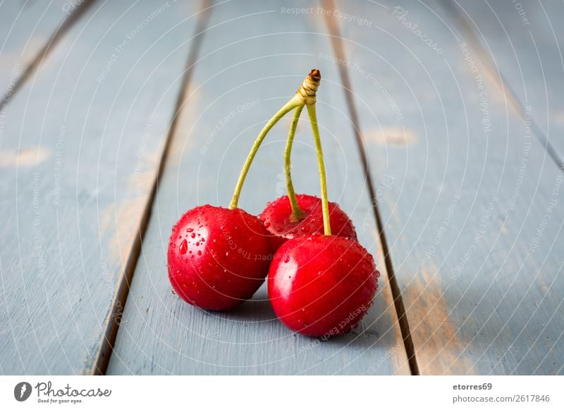 Delicious cherries on a blue wooden table Cherry Fruit Dessert Food Healthy Eating Food photograph Snack Baked goods Home-made Sweet Baking Summer Red Diet