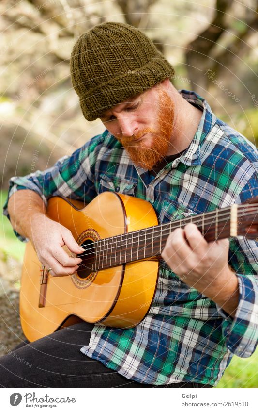 Hipster man with red beard Leisure and hobbies Playing Entertainment Music Human being Man Adults Musician Guitar Nature Red-haired Moustache Cool (slang)