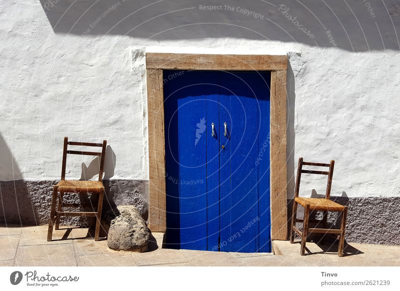 Blue door and 2 chairs on Mediterranean white house wall Summer Flat (apartment) Village Fishing village House (Residential Structure) Building Wall (barrier)
