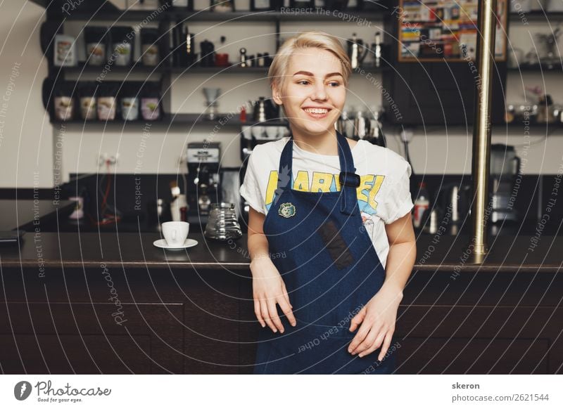 smiling Barista girl in a coffee shop Lunch To have a coffee Plate Lifestyle Healthy Student Apprentice Work and employment Profession Workplace Kitchen Career
