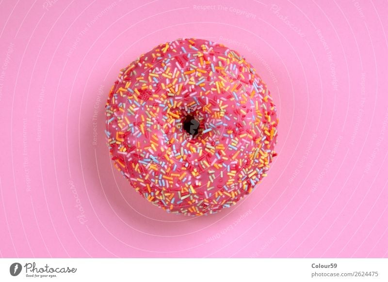 Sweet donut Food Dessert Candy Pink Donut Background picture Top Snack dough doughnut Eating Sugar calories glazed Coulored sugar candy variegated biscuits