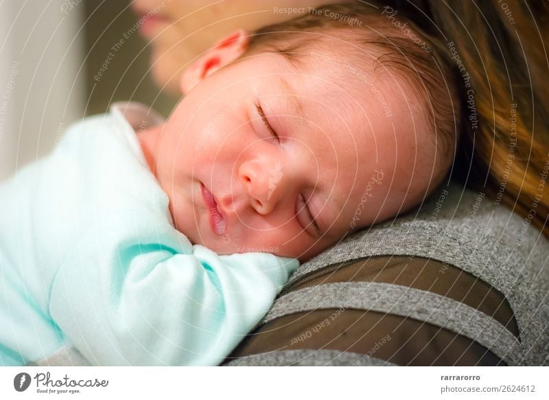 baby sleeping on his mother's shoulder Happy Beautiful Face Life Child Human being Baby Boy (child) Woman Adults Parents Mother Family & Relations Infancy Love