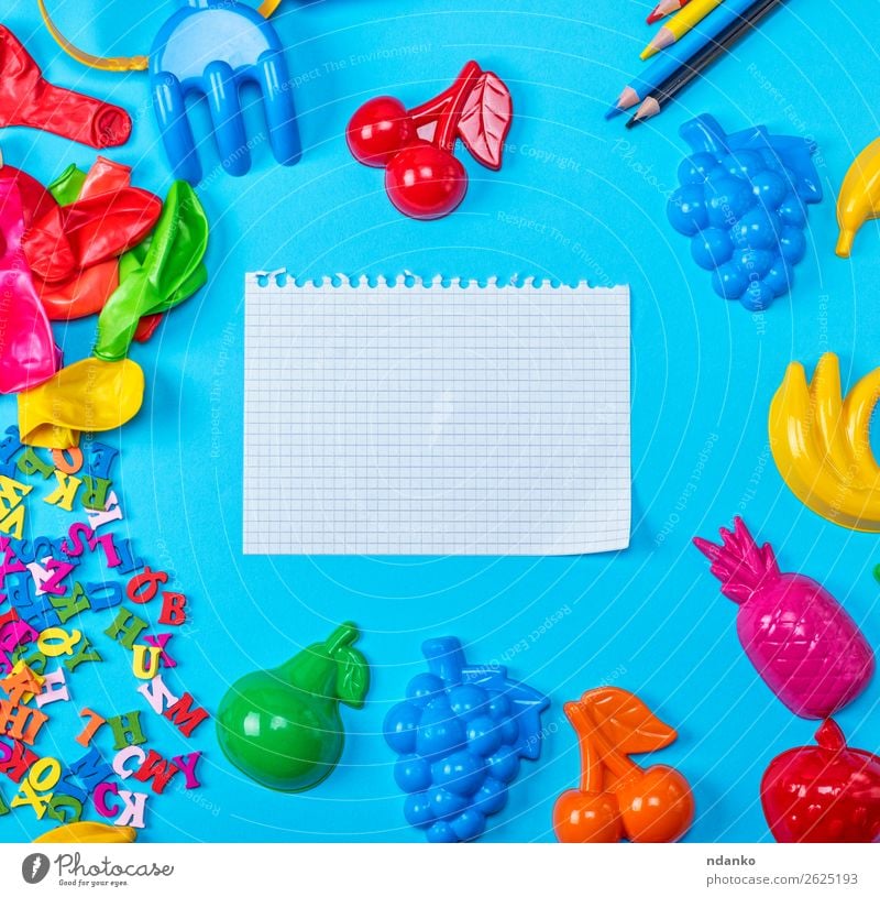 empty white sheet torn out of notepad Fruit Table Child School Study Office Paper Piece of paper Pen Toys Balloon Wood Plastic Write Above Clean Blue Yellow Red