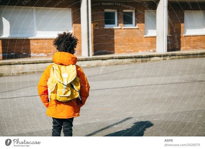 Little school boy at the entrance of school Winter Child School Boy (child) Autumn Coat Small Yellow Black schooler Backpack student handsome african descendant