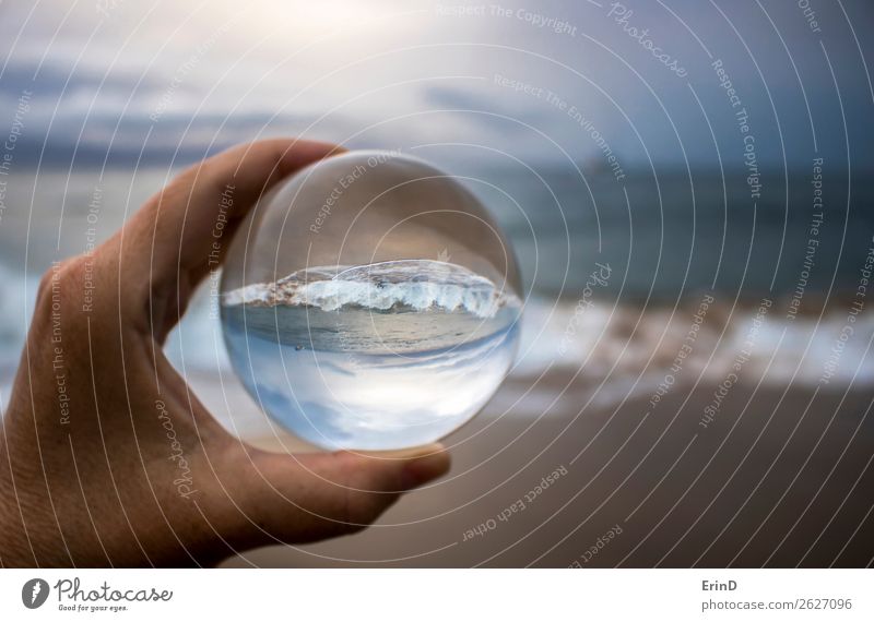 Surf Breaking on Sandy Beach Captured in Glass Ball Design Beautiful Vacation & Travel Ocean Environment Nature Landscape Sky Clouds Weather Storm Coast Sphere