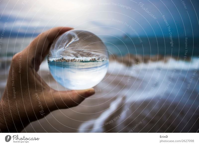 Storm Surf Captured in Glass Ball Reflection Design Beautiful Vacation & Travel Beach Ocean Environment Nature Landscape Sky Clouds Weather Coast Sphere Line