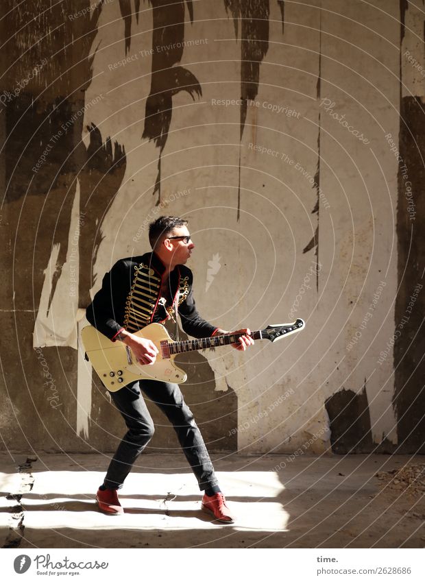 GuitarMan Masculine Adults 1 Human being Artist Music Musician Ruin lost places Wall (barrier) Wall (building) Jacket Sunglasses Short-haired Playing Stand
