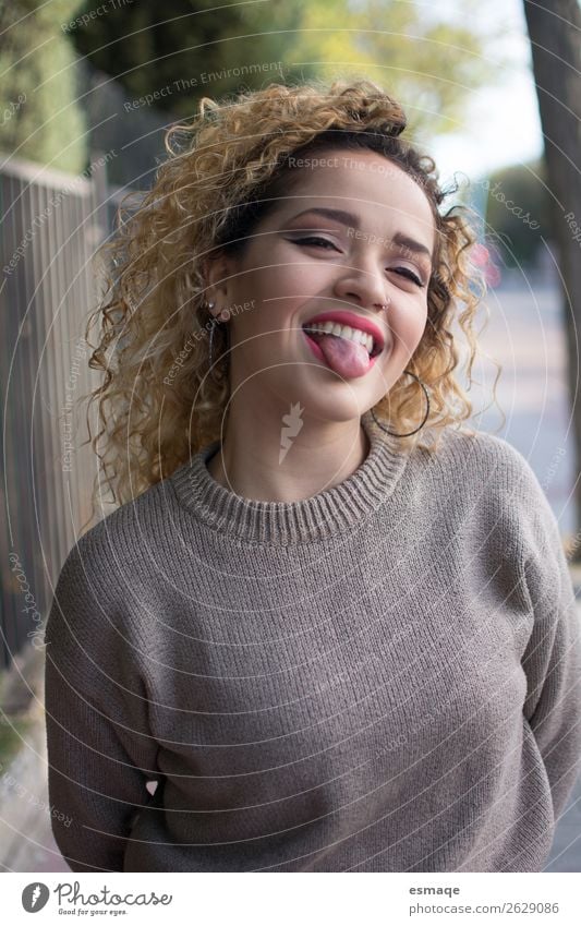 Portrait of young and funny woman sticking out her tongue Lifestyle Joy Beautiful Healthy Young woman Youth (Young adults) Woman Adults 1 Human being Nature