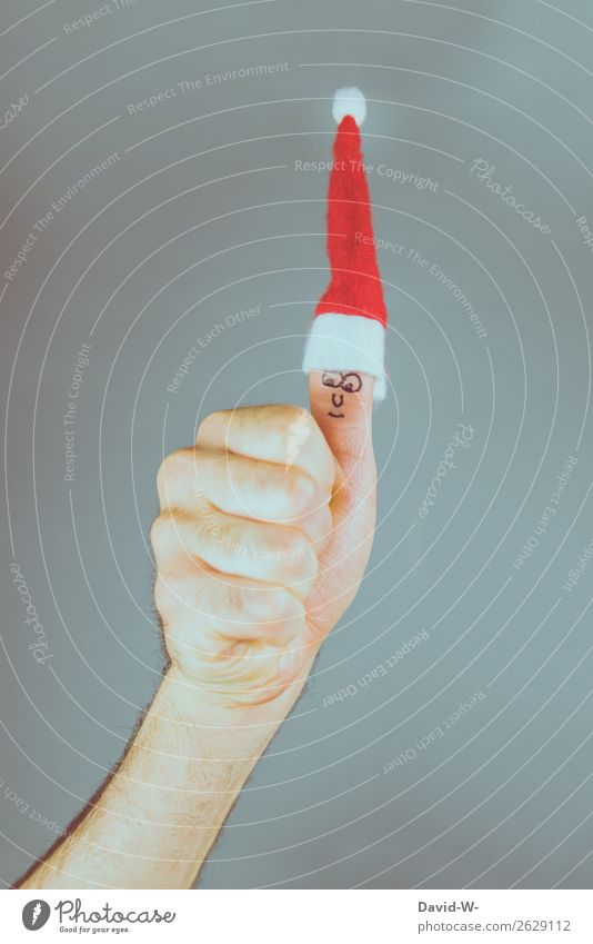 Christmas - thumbs up Santa Claus hat Face Smiling Thumbs up Anticipation Positive Christmas mood