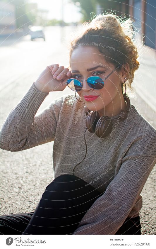 Young woman with Sun glasses and headphones Lifestyle Joy Beautiful Vacation & Travel Adventure Human being Youth (Young adults) Music Listen to music Village