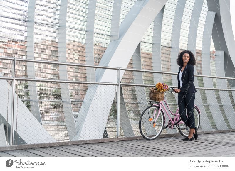 Business black woman with vintage bicycle in a bridge Bicycle Cycling Vintage Woman Black Bridge Mixed race ethnicity City Youth (Young adults) Human being Suit