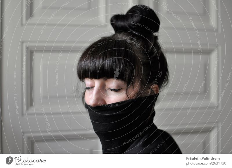young woman with bangs, bun and closed eyes in turtleneck sweater Feminine Young woman Youth (Young adults) 1 Human being 18 - 30 years Adults Sweater