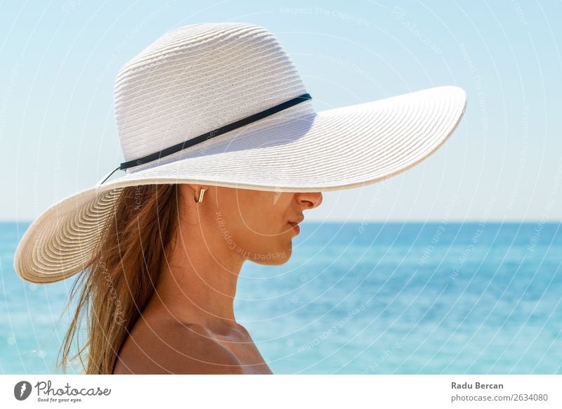 Young Woman Portrait With White Beach Hat Lifestyle Elegant Style Joy Beautiful Relaxation Leisure and hobbies Vacation & Travel Freedom Summer Summer vacation