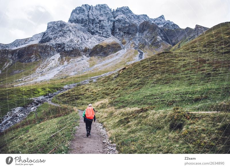 Ascent to the Mädlejoch Adventure Hiking Young woman Youth (Young adults) 18 - 30 years Adults Nature Landscape Autumn Alps Mountain Backpack Blonde Going