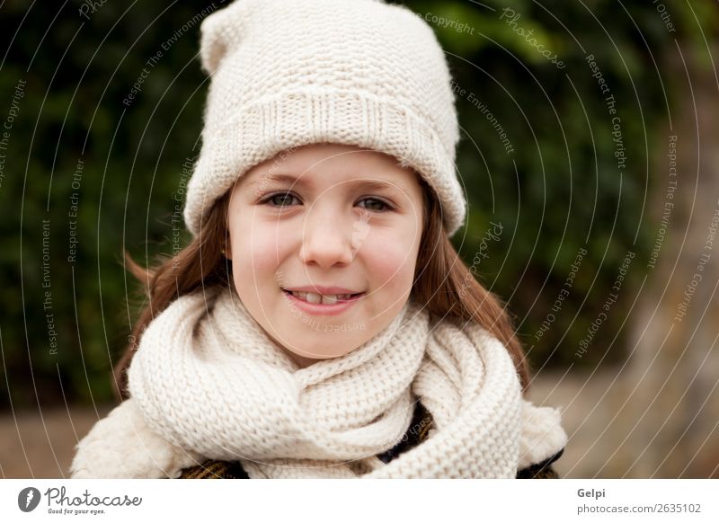 Pretty girl with wool hat in a park Joy Happy Beautiful Face Winter Garden Child Human being Toddler Woman Adults Family & Relations Infancy Nature Autumn