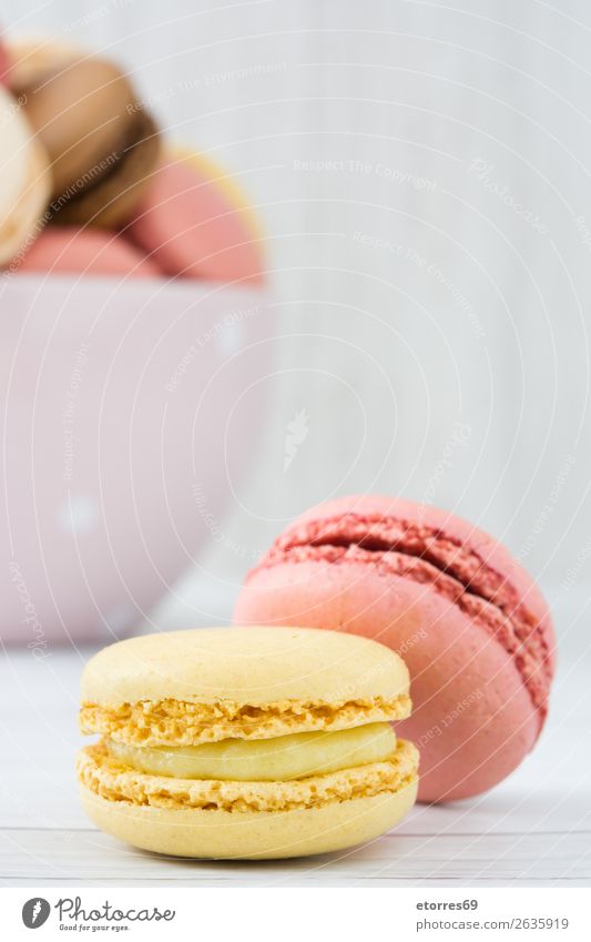 Colorful macarons on white wooden table Macaron Strawberry Lemon Dessert Coffee Yellow Chocolate Confectionary Raspberry Tradition Candy cut out cookies Tasty