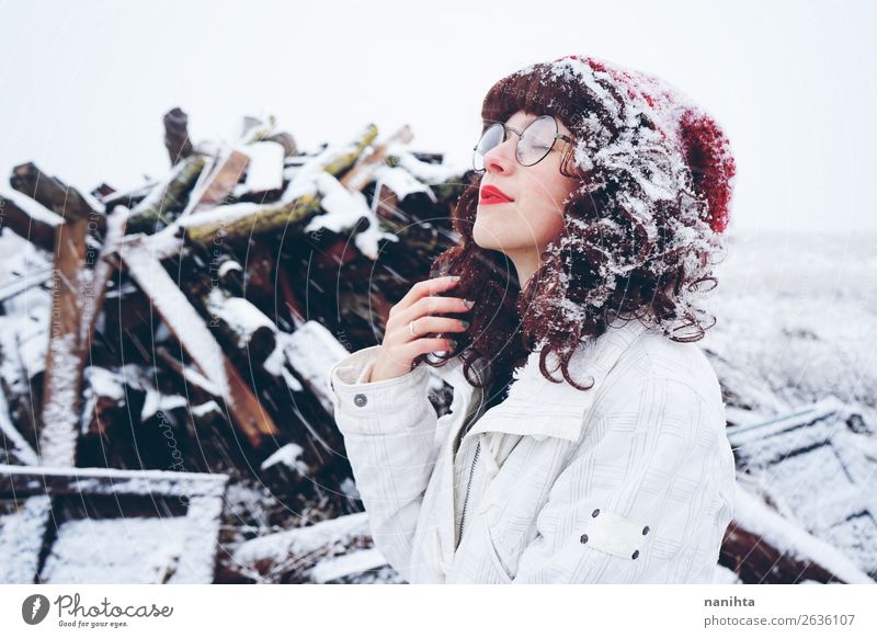 Young woman enjoying a snowy winter day Lifestyle Style Happy Face Leisure and hobbies Freedom Winter Snow Winter vacation Christmas & Advent New Year's Eve