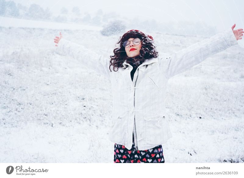 Young and pretty woman enjoying a snowy winter day Lifestyle Style Happy Face Wellness Well-being Senses Leisure and hobbies Adventure Freedom Winter Snow