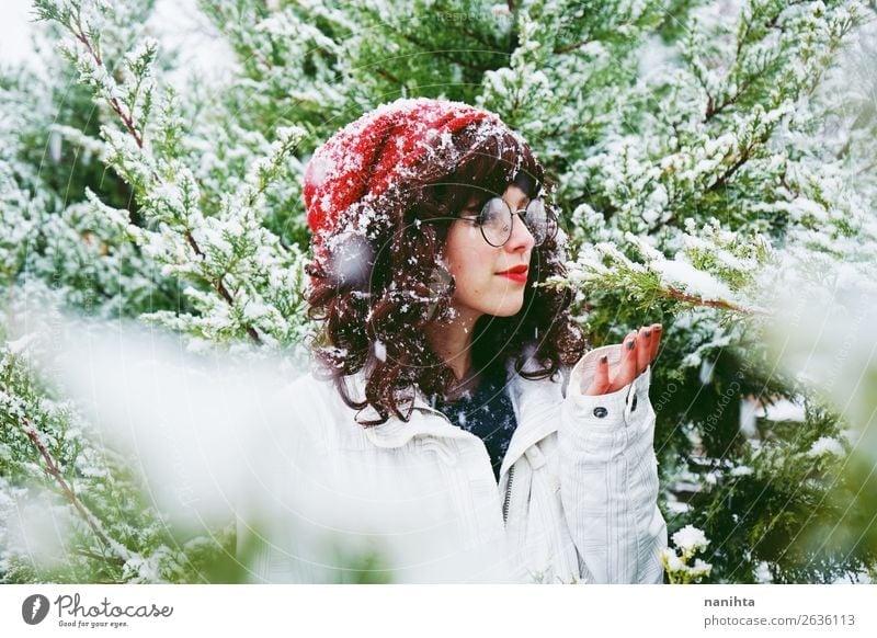 Young woman enjoying a snowy winter day Lifestyle Style Happy Adventure Freedom Winter Snow Christmas & Advent New Year's Eve Human being Feminine
