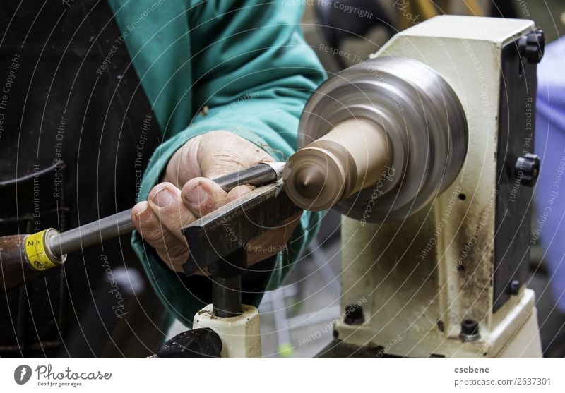 Man working with a wood lathe Design Work and employment Workplace Industry Craft (trade) Tool Technology Adults Hand Wood Metal Movement turning Carpenter