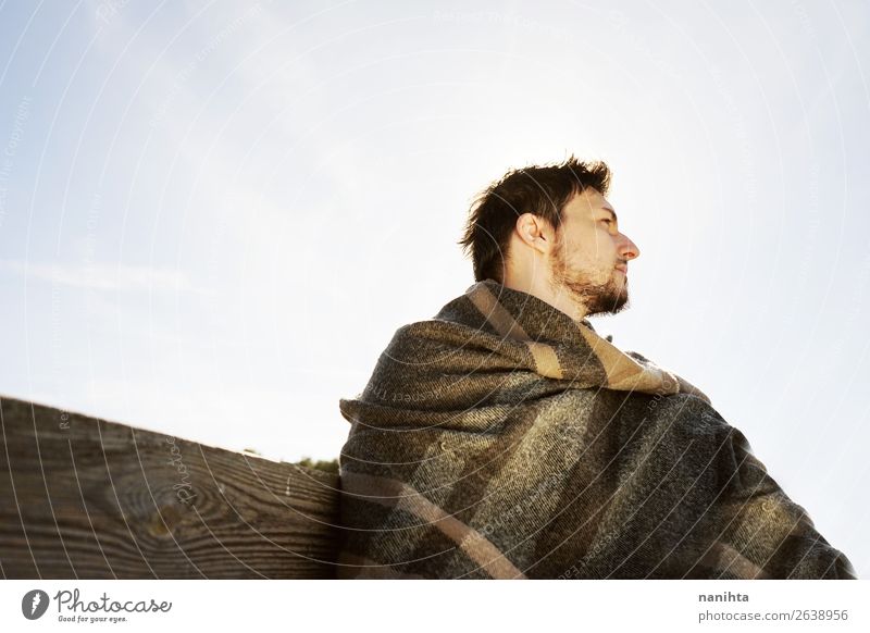 Side face of a young man enjoying in calm in the morning Lifestyle Happy Face Relaxation Calm Freedom Sun Man Adults Autumn Beautiful weather Scarf To enjoy
