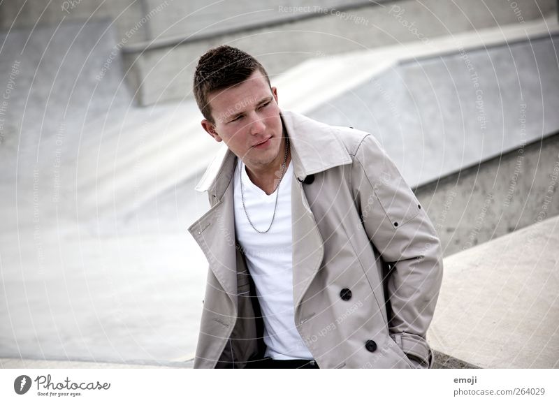 grEy Masculine 1 Human being Fashion Jacket Short-haired Beautiful Sit Gray Cool (slang) Colour photo Subdued colour Exterior shot Copy Space left