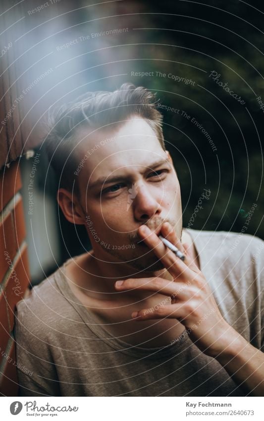 portrait of smoking man addiction adult beard casual caucasian cigarette cool face guy habit handsome health lifestyles look male masculinity outdoors person