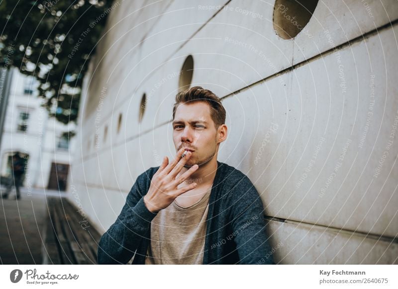 portrait of smoking man addiction adult beard casual caucasian cigarette cool face guy habit handsome health lifestyles look male masculinity outdoors person
