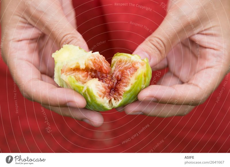 Fig heart in hands Fruit Diet Woman Adults Hand Nature Heart Fresh Juicy Green Red figs Mature food healthy sweet Organic Mediterranean fiber Hold Porcelain